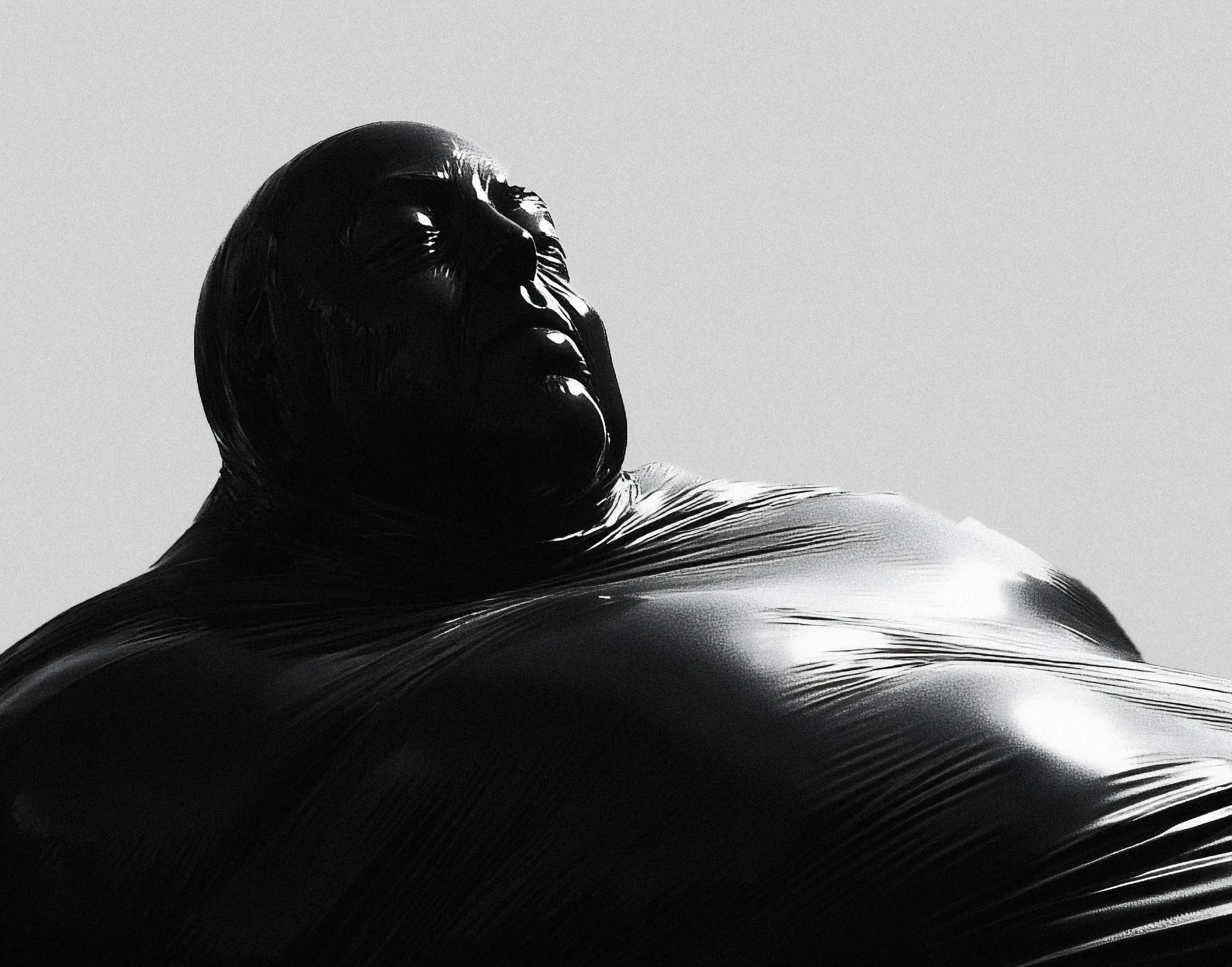 A side view of Mr. Crank, showcasing his larger-than-life form, with smooth, liquid-like surfaces and intricate glossy reflections.