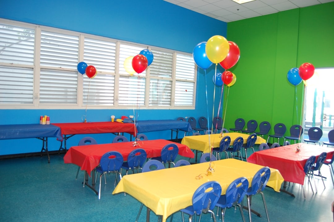 Private room decorated with birthday party decor.