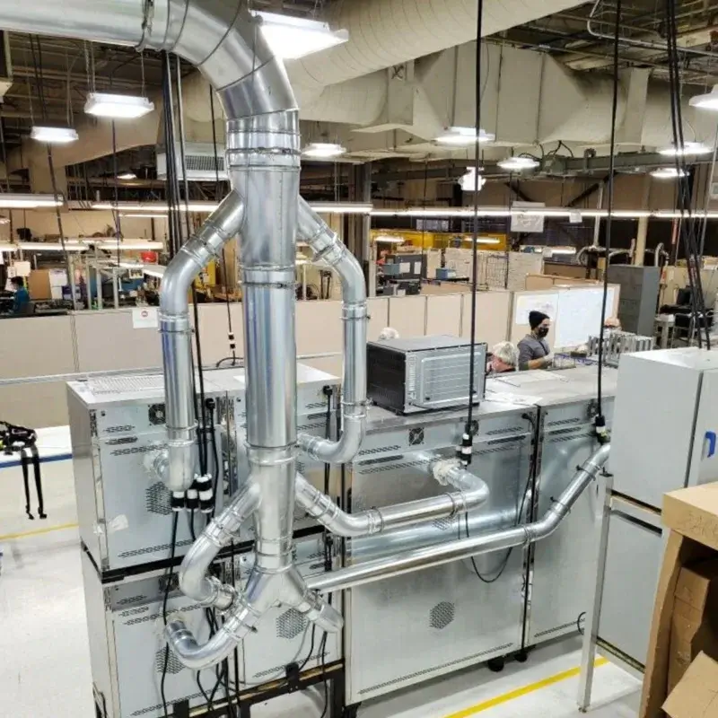 Clamp together duct, branches, and manifolds installed in an industrial facility.