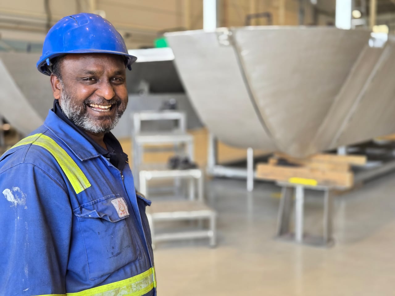 Harbor Guard applicator Ajay coating an aluminium surface
