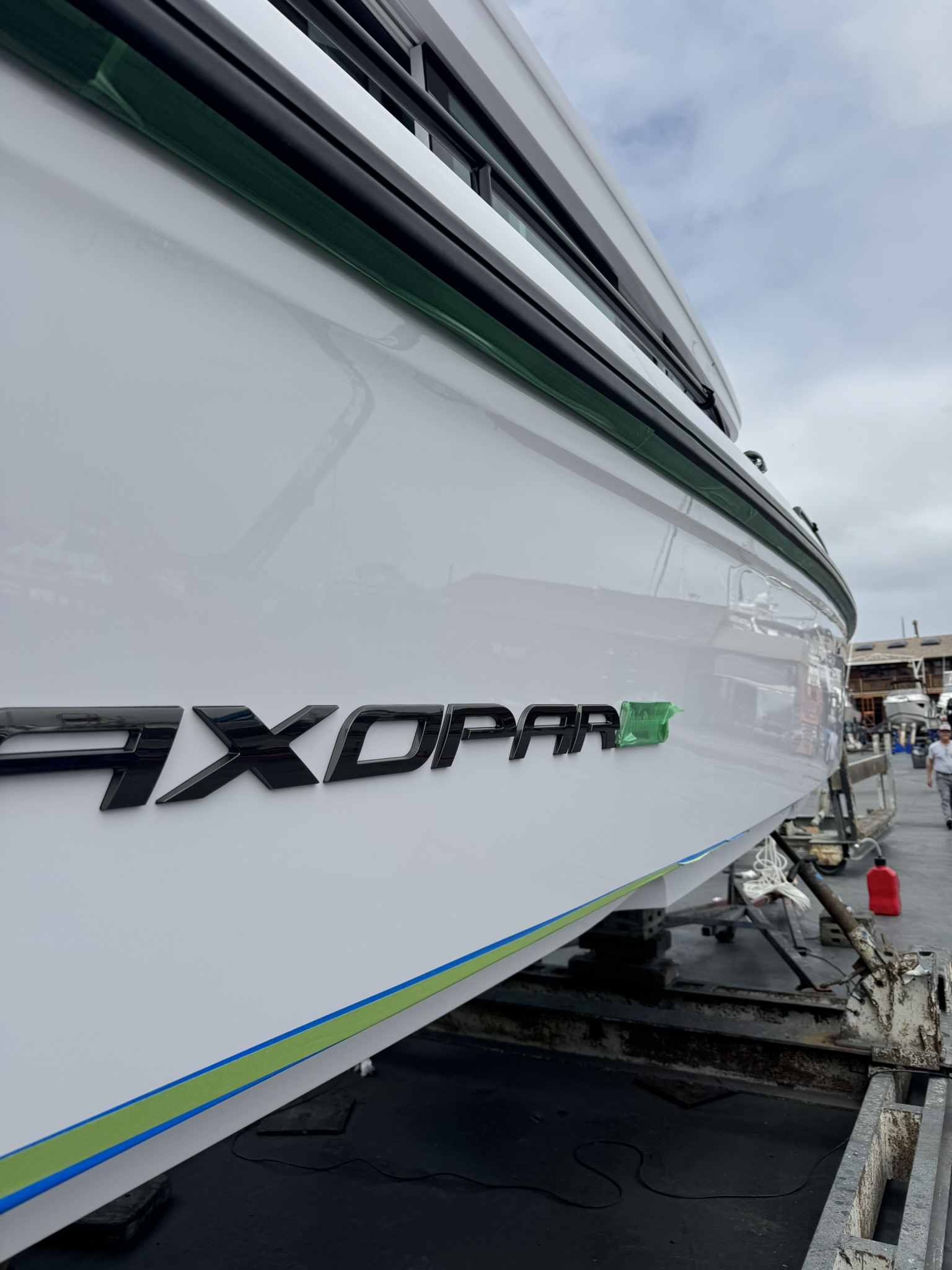 White gelcoat boat surface protected with Harbor Guard