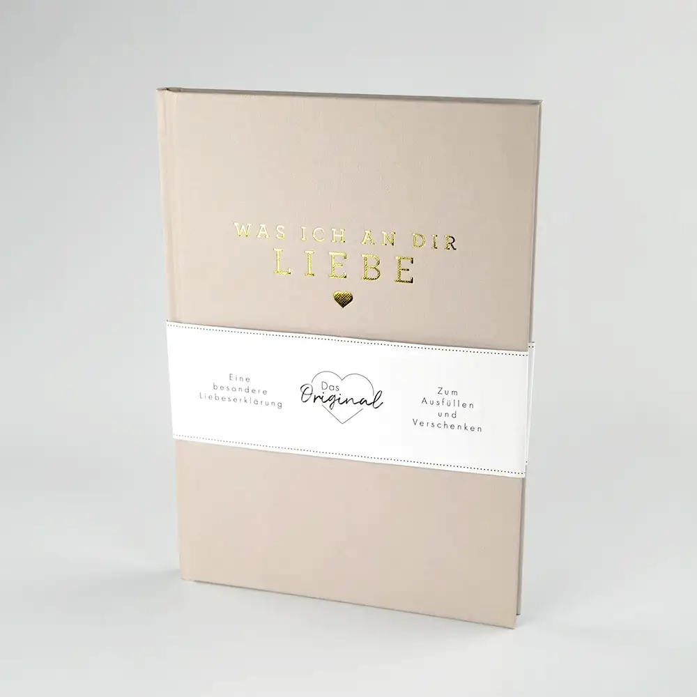 Ausfüllbuch „Was ich an dir liebe" mit Leineneinband und goldenem Schriftzug