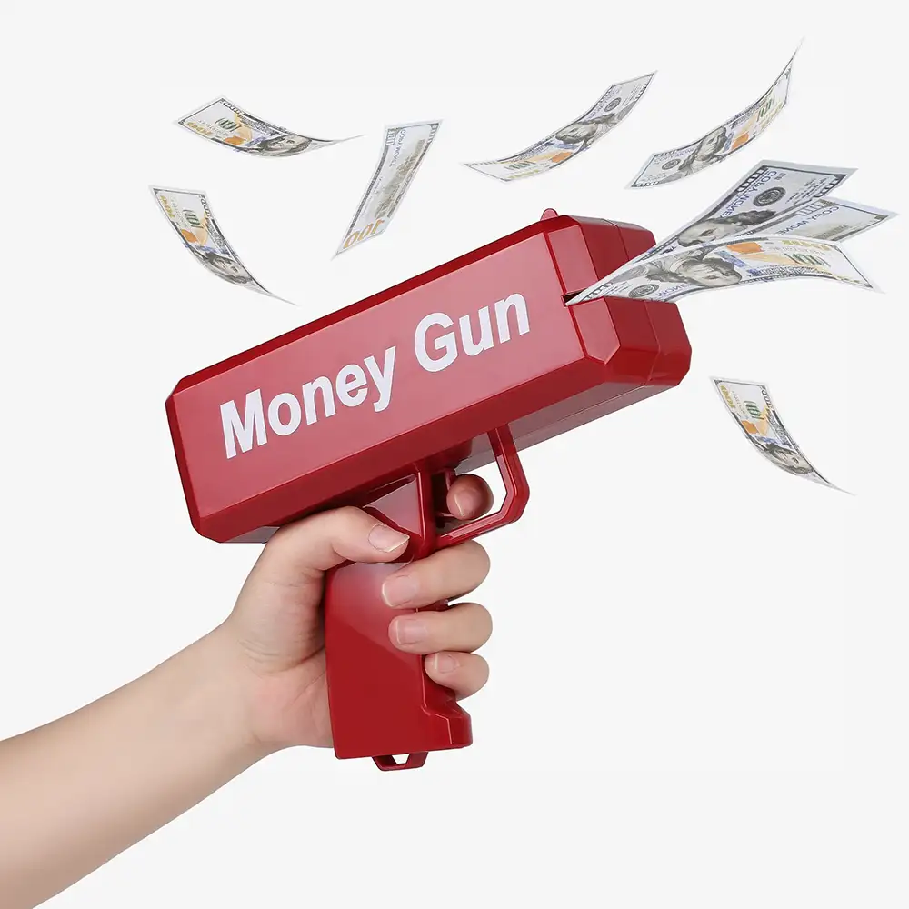 Goldene Money Gun Geldpistole, die Spielgeld-Dollarscheine in die Luft schießt