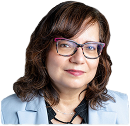 Woman with shoulder-length brown hair and glasses wearing a light blue blazer and black top.