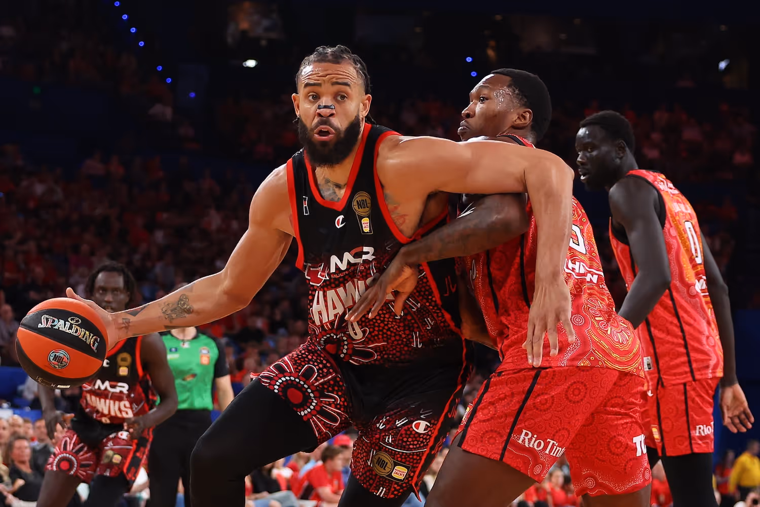 Clutch McGee wills Hawks to gutsy road win