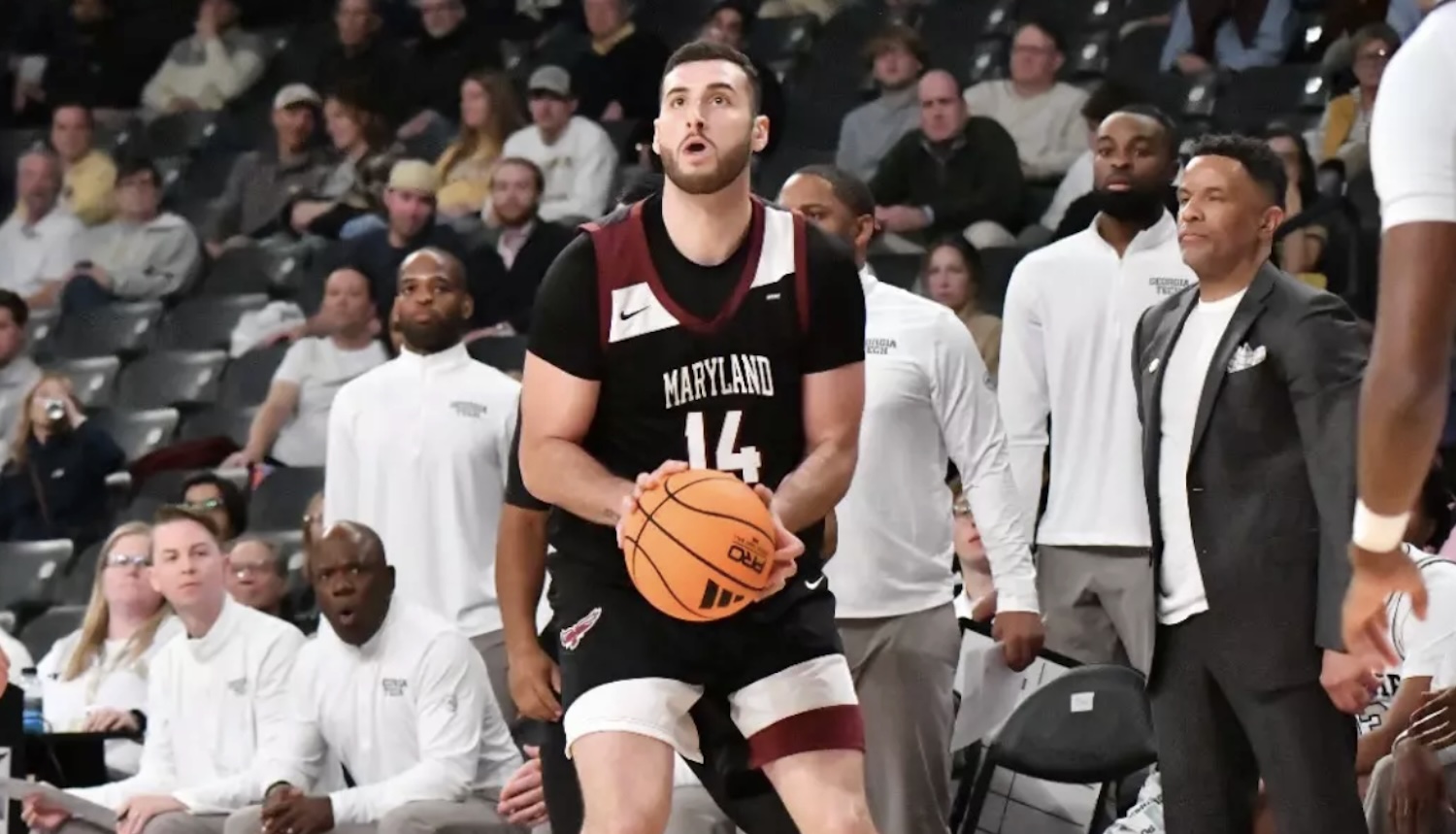 Locandro shoots 75% from deep, scores 18 points