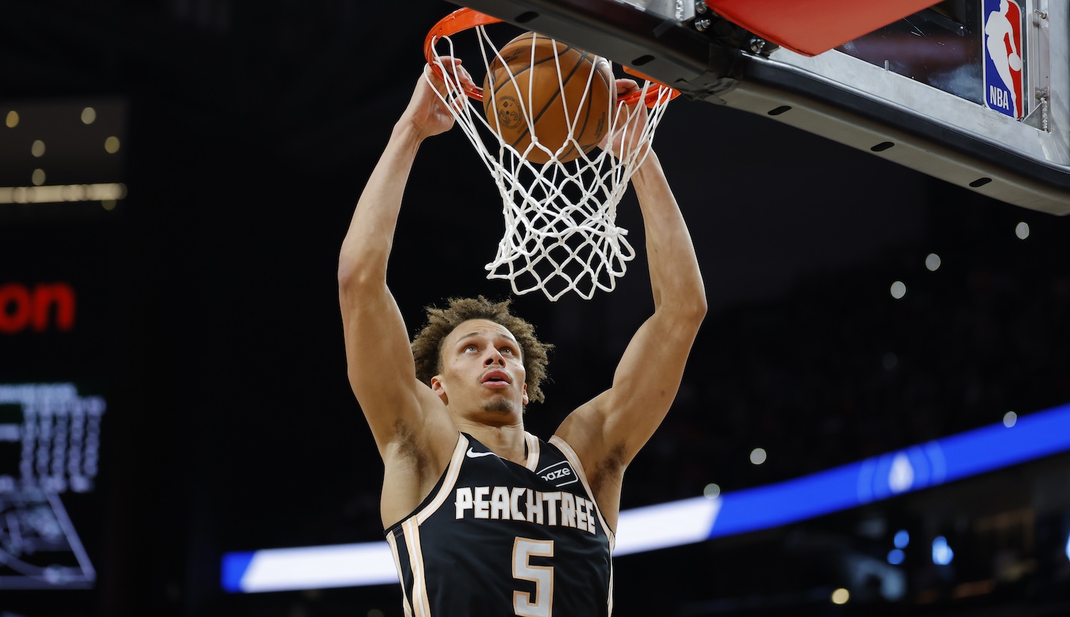 Daniels near triple-double as Bucks escape Hawks
