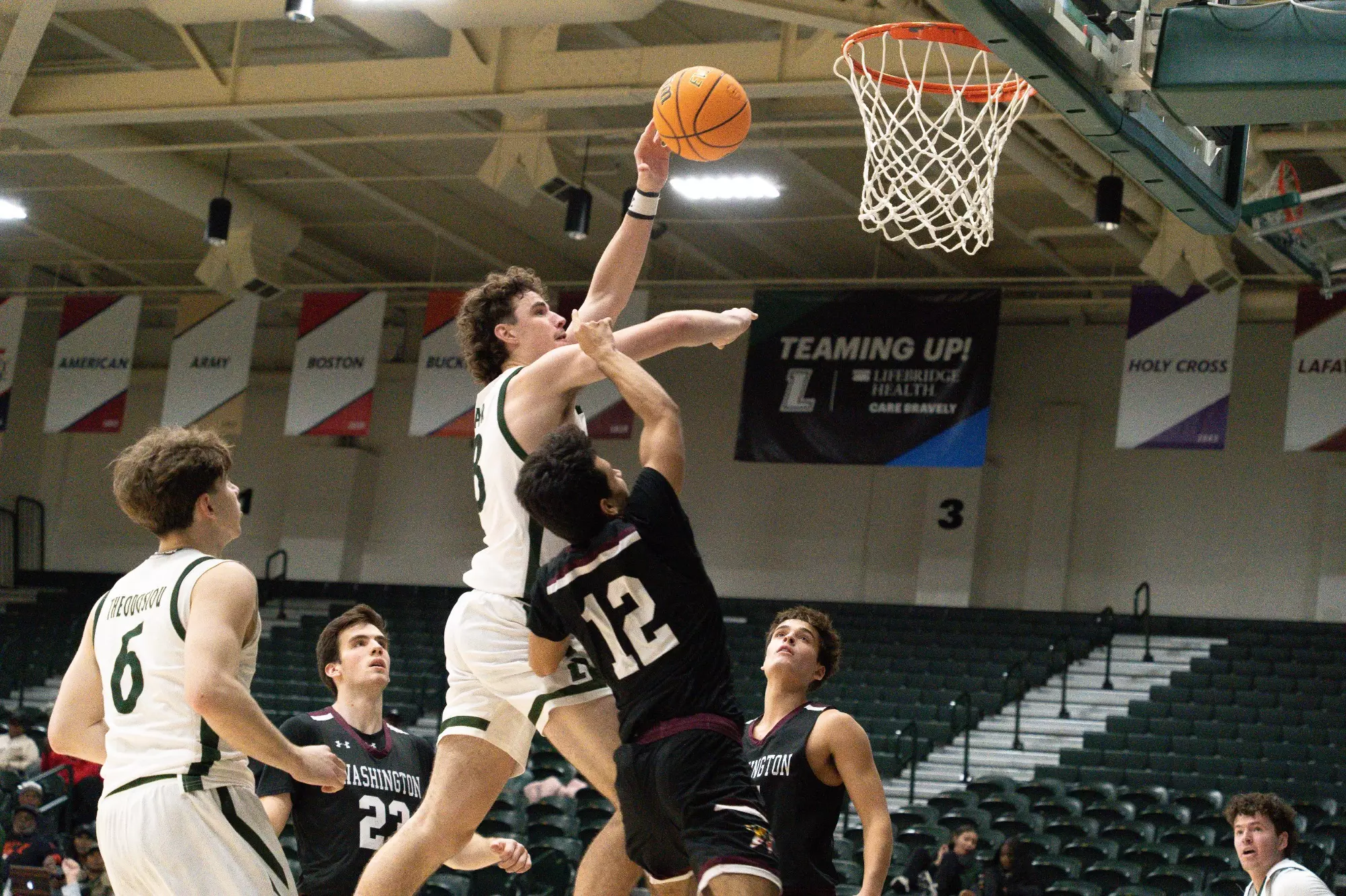 Adair is painting his own canvas at Loyola Maryland