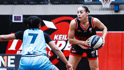 Rocci toys with Chargers in triple-double clinic