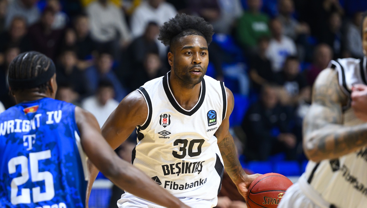 Kelan Martin joins Hawks after Harvey's citizenship frees spot