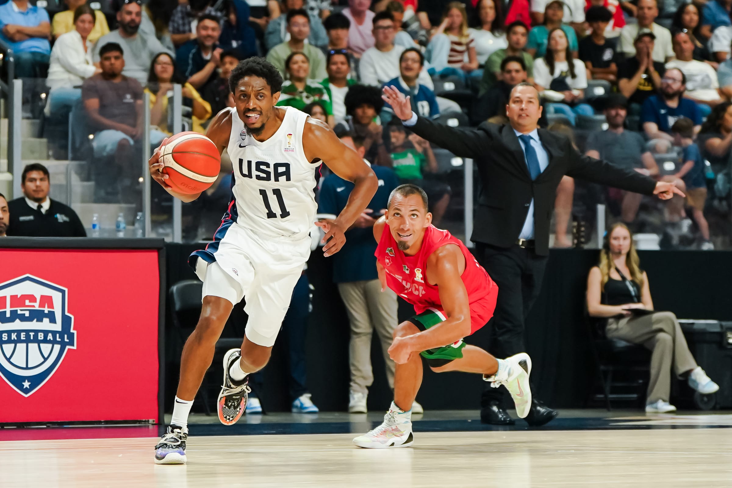 Brandon Knight drives to the basket for Team USA