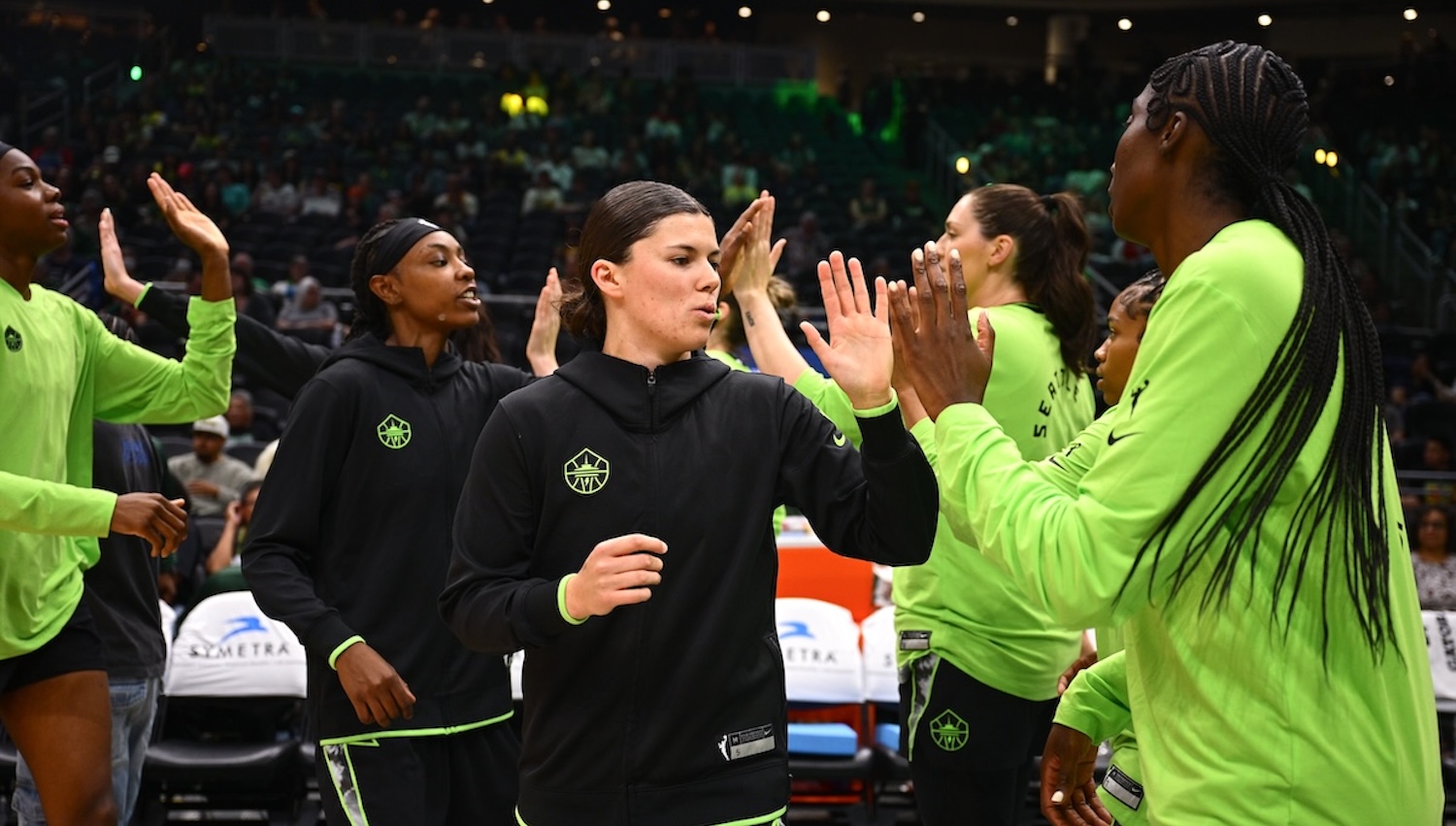 Storm guard Jade Melbourne celebrates with Australian forward Ezi Magbegor against the Portland Fire at Climate Pledge Arena in Seattle on July 4, 2026.