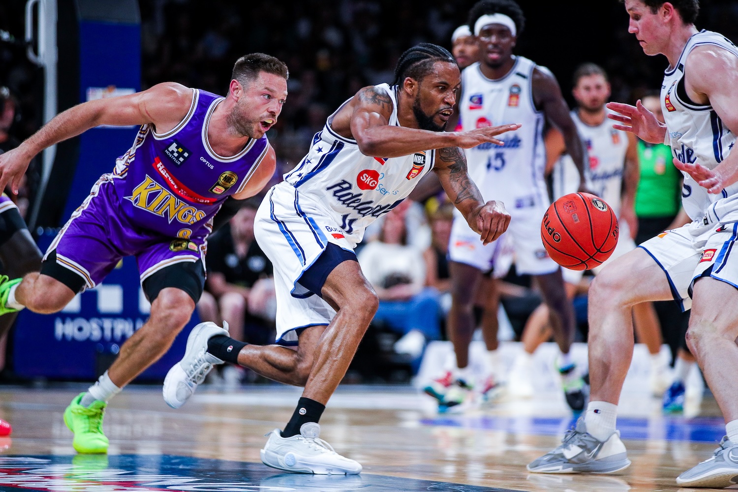 36ers guard Bryce Cotton chases a loose ball ahead of Australian guard Matthew Dellavedova of the Sydney Kings at Afterpay Arena in Sydney on October 11, 2026