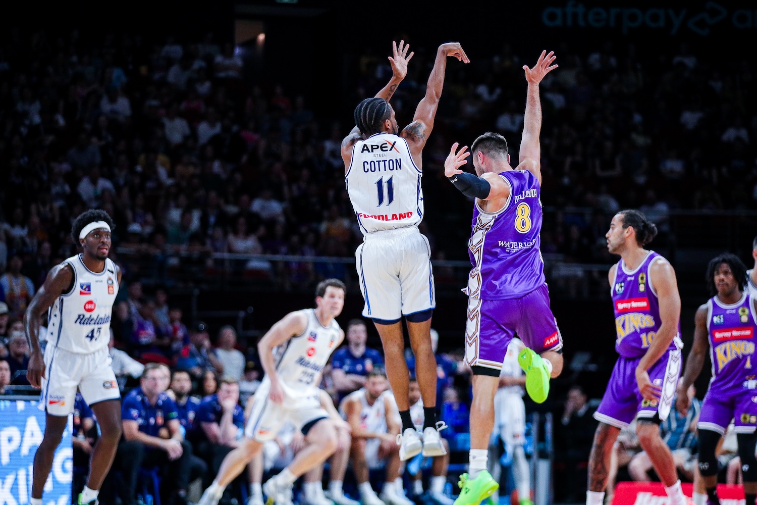 36ers guard Bryce Cotton shoots over Australian guard Matthew Dellavedova of the Sydney Kings at Afterpay Arena in Sydney on October 11, 2026