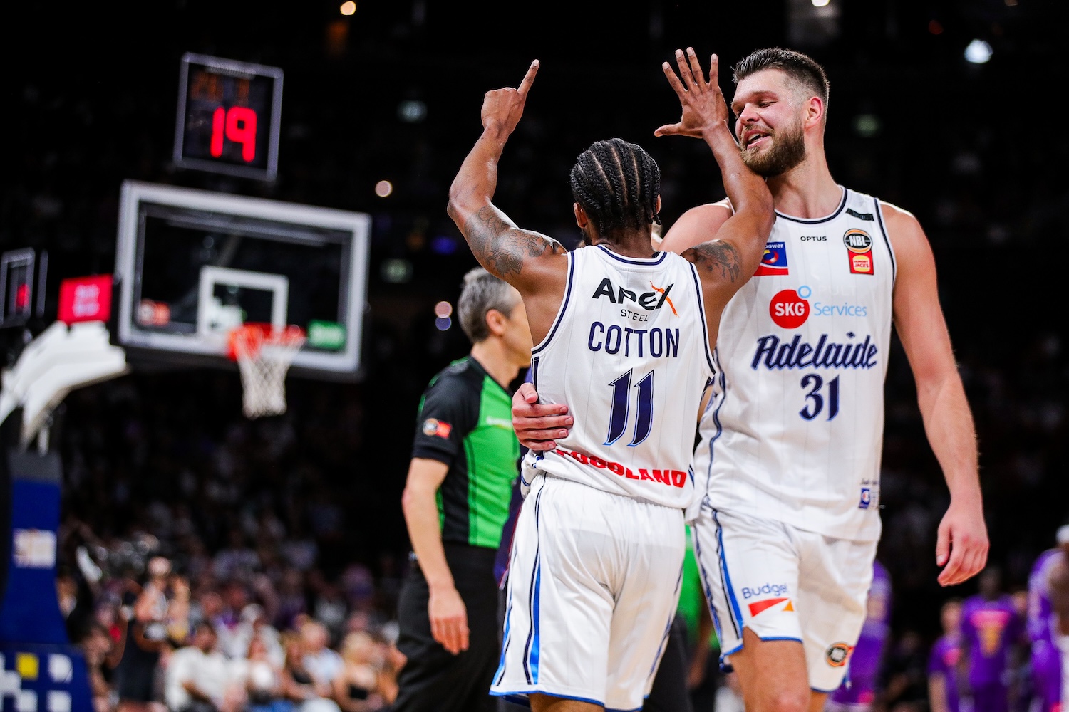 36ers guard Bryce Cotton celebrates with forward-centre Nick Rakocevic against the Sydney Kings at Afterpay Arena in Sydney on October 11, 2026