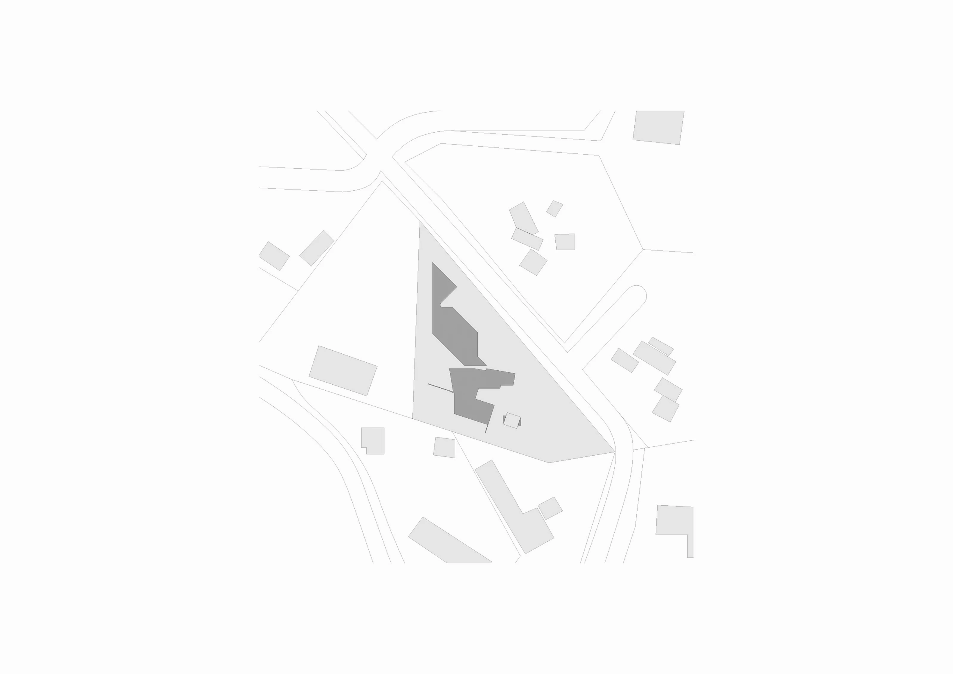 Map showing a triangular property with two larger buildings and smaller structures nearby.