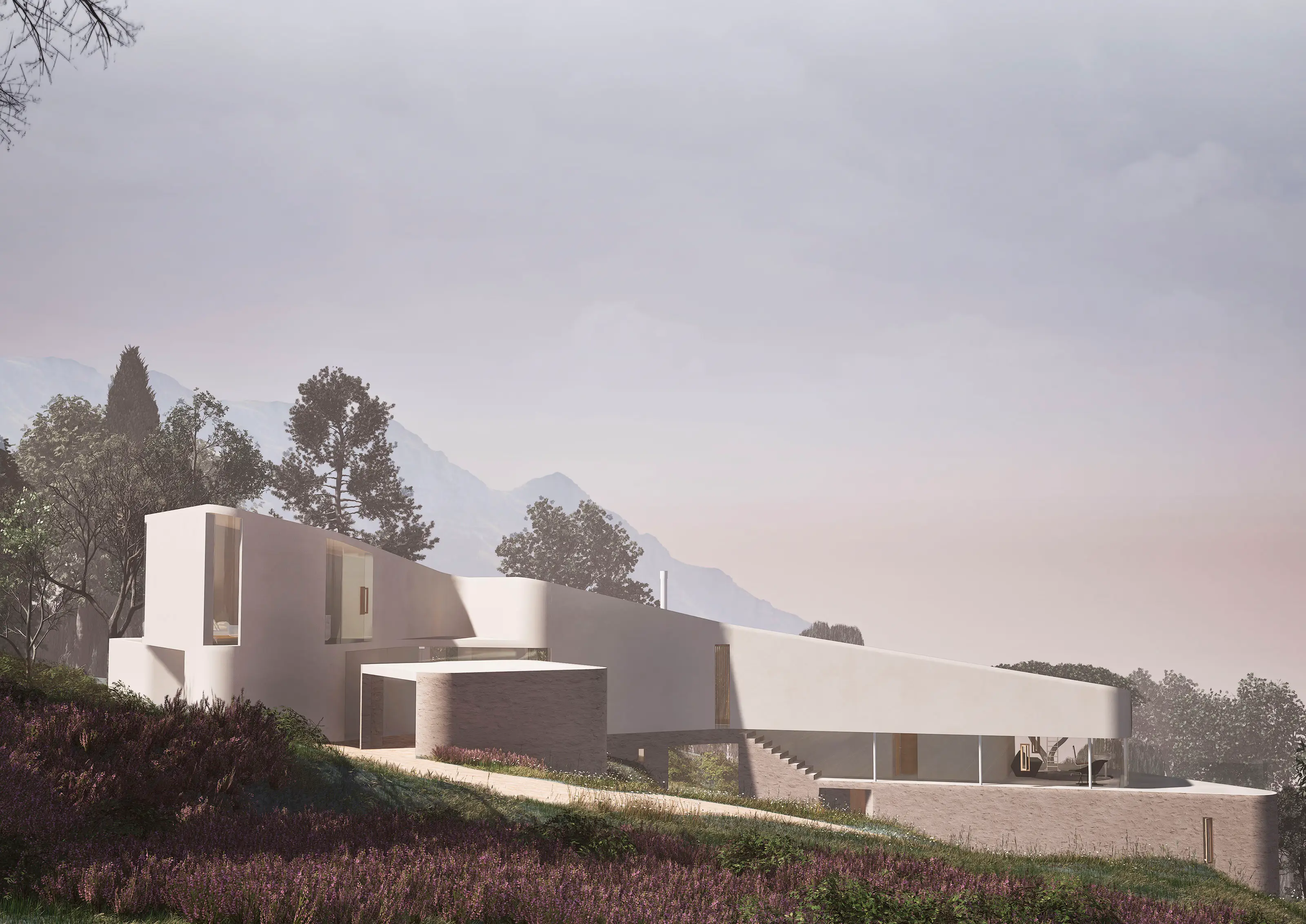 Modern hillside house with white curved walls, large windows, surrounded by trees and purple flowering plants.