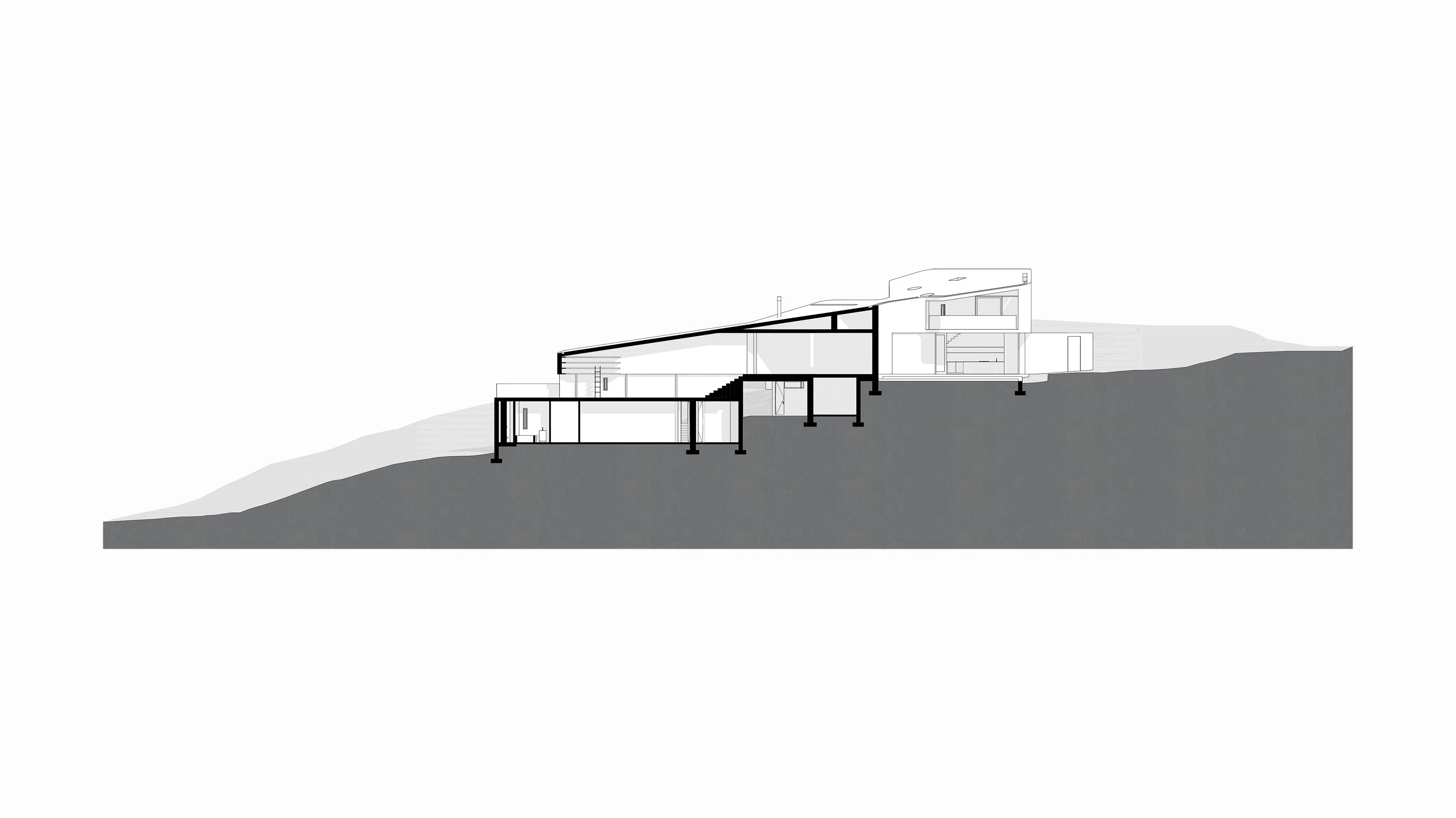 Architectural section drawing of a modern house built on a sloping site with multiple levels.
