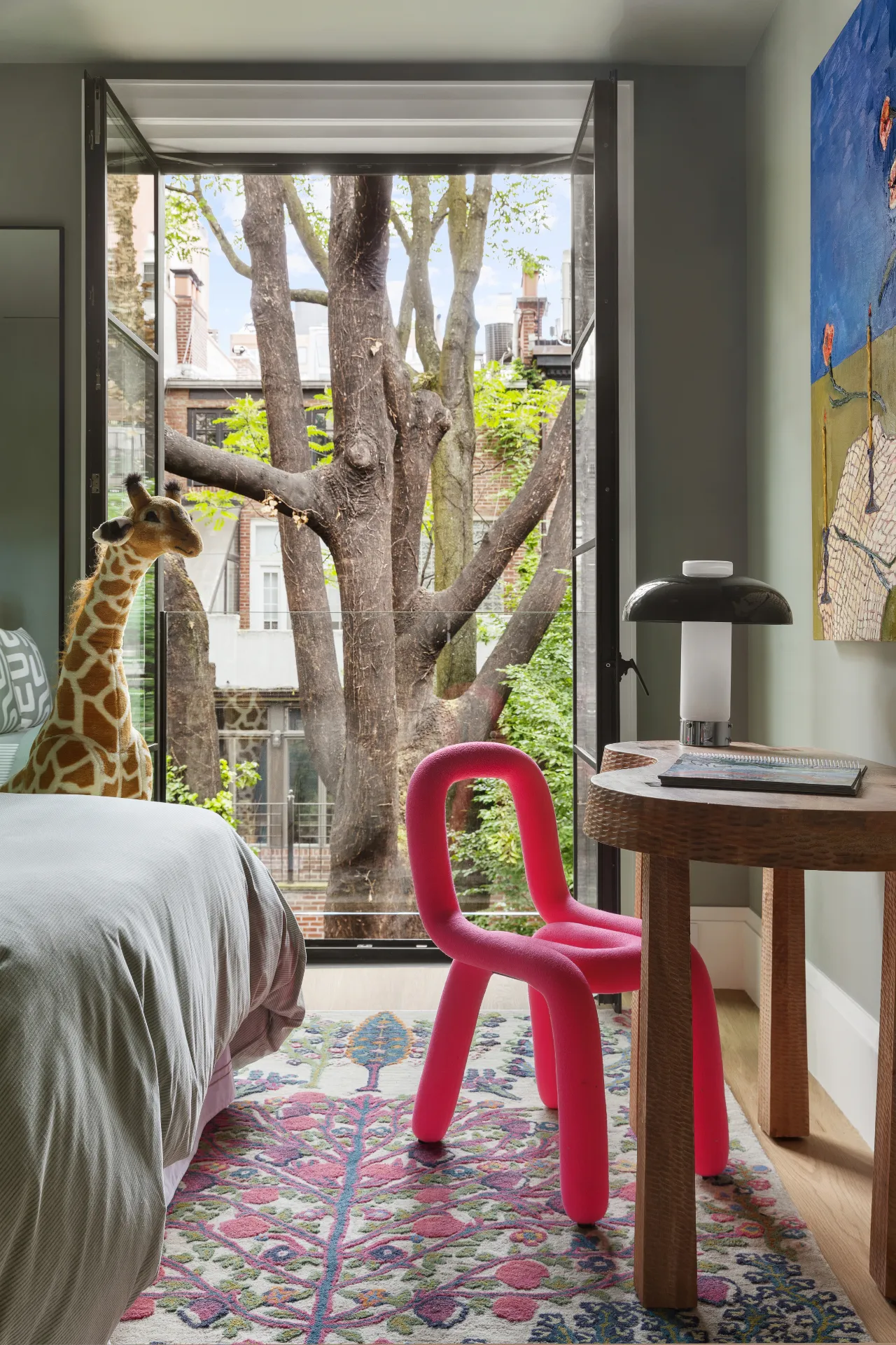 desk with red chair in bedroom