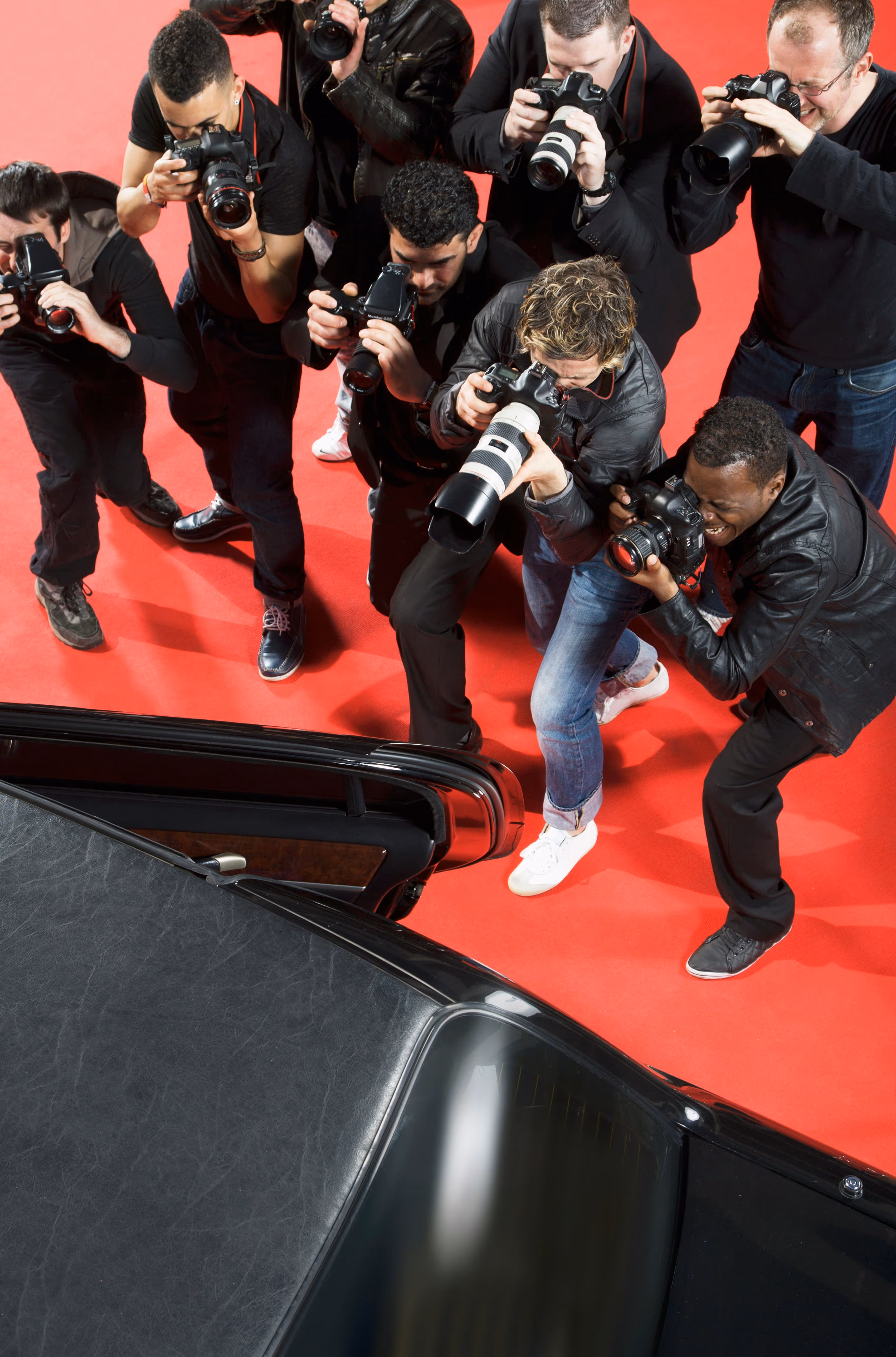 Celebrite et paparrazi sur un tapis rouge