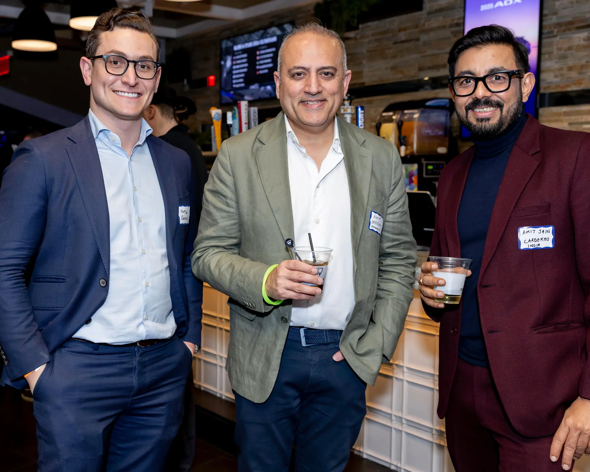 Harry Caruso, founder of Caruso & Co., networking with automotive industry professionals at NADA 2026