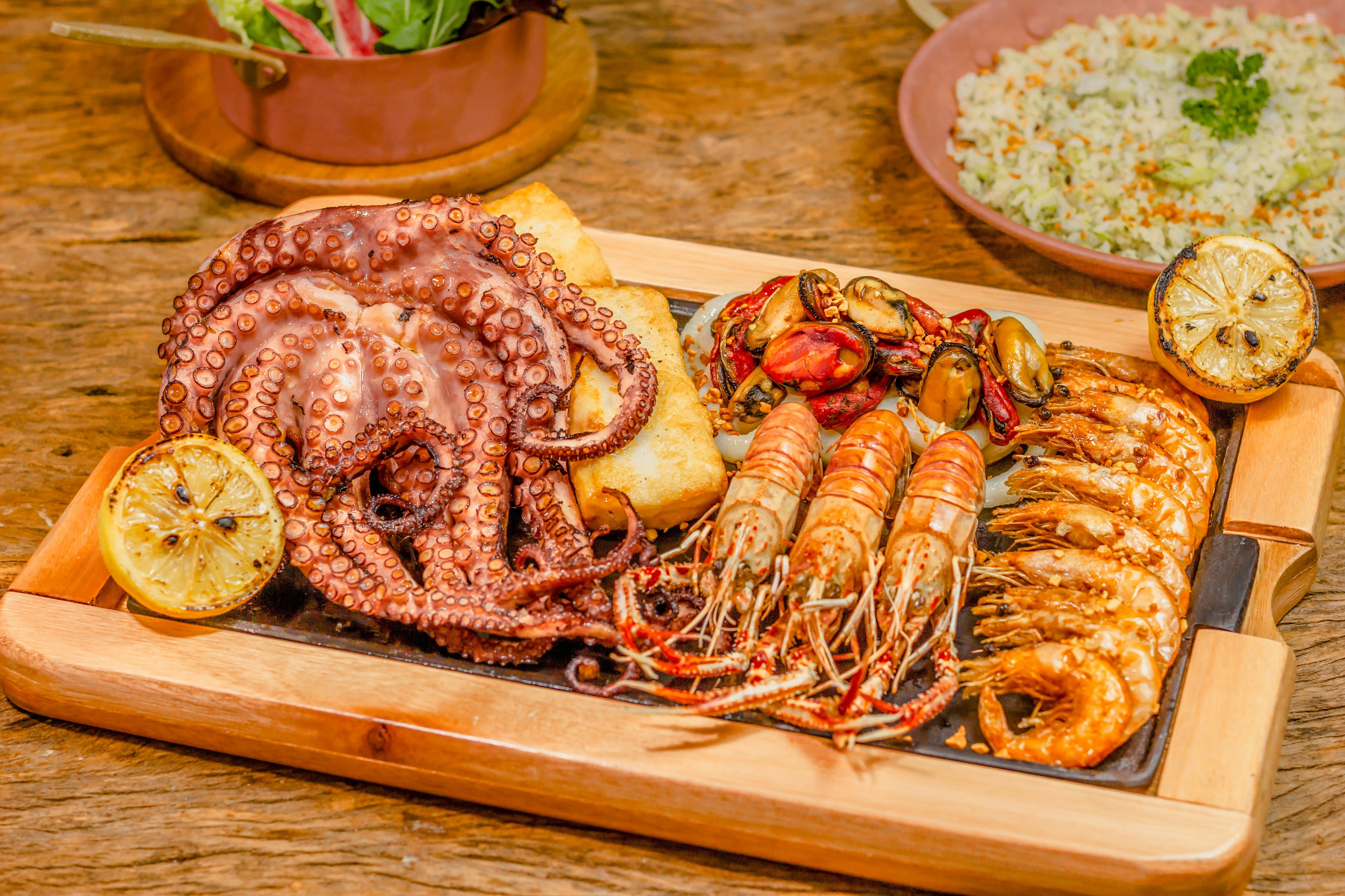 seafood on a wooden cutting board