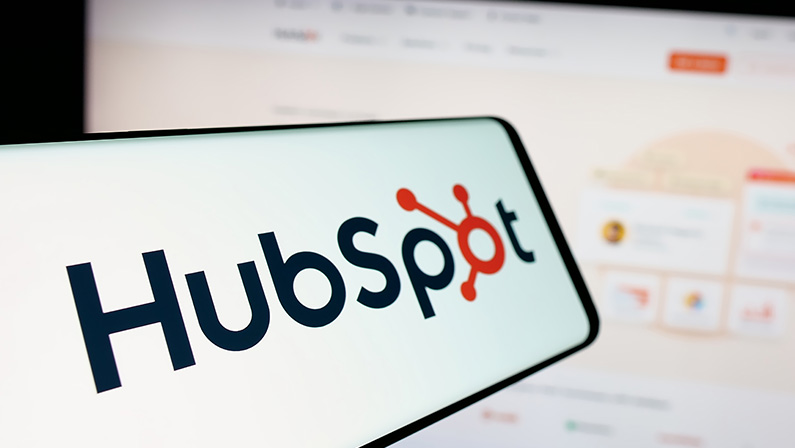 Stuttgart, Germany - 01-28-2025: Cellphone with logo of American marketing software company HubSpot Inc. on screen in front of website. Focus on center-left of phone display. Unmodified photo.