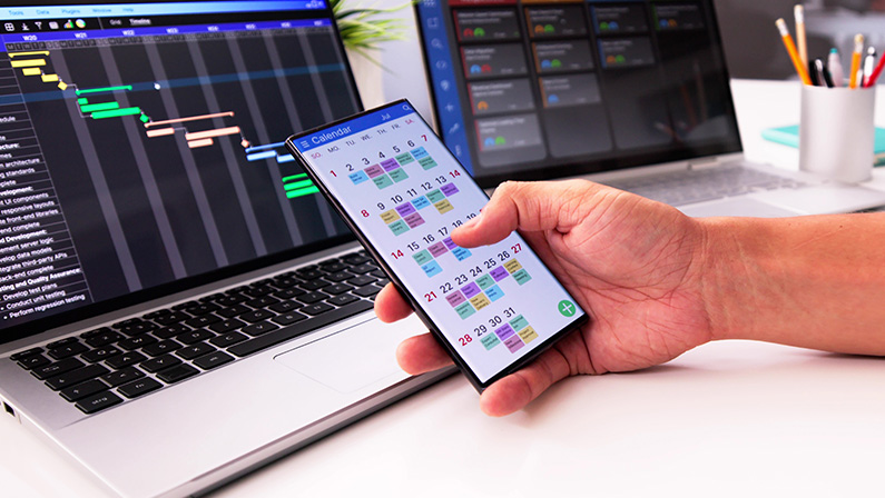 Appointment Schedule Planner And Date Calendar On Laptop And Phone