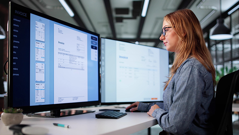 Medical Billing Audit: Young Woman Managing Payroll Software Remotely