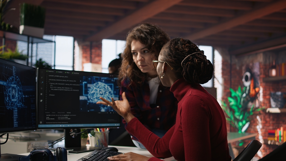 Teamworking engineers coding advanced AI algorithm and machine learning models enhancing automation