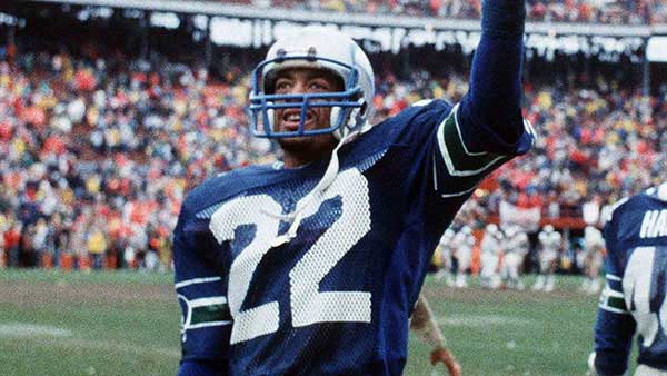 Dave Brown in Seahawks uniform waving to the stadium crowd