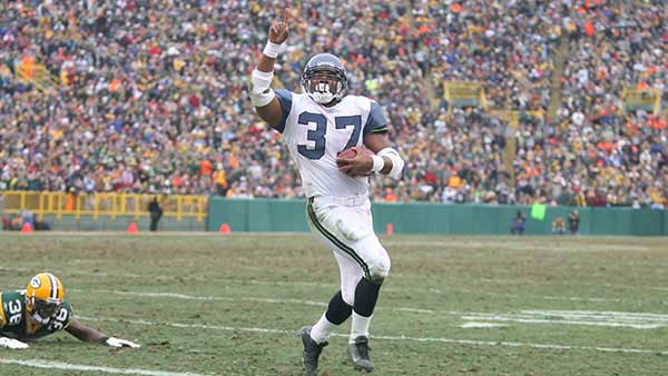 Shaun Alexander rushing for a touchdown
