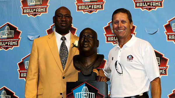 Cortez Kennedy standing at Pro Football Hall of Fame