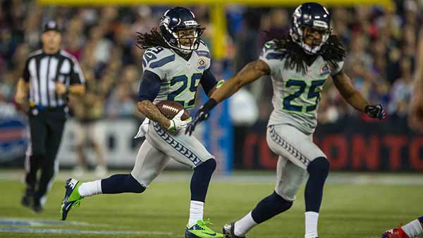 Group of Seahawks wearing grey away uniforms