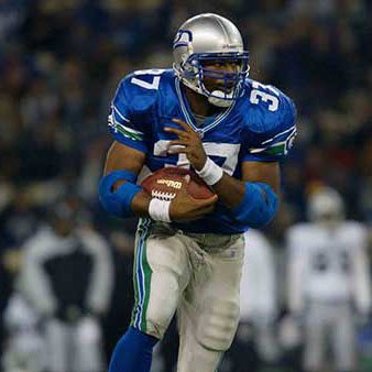 Shaun Alexander running with the football