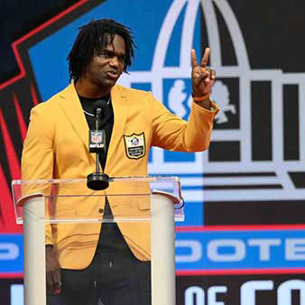 Edgerrin James posing in his Hall of Fame Jacket