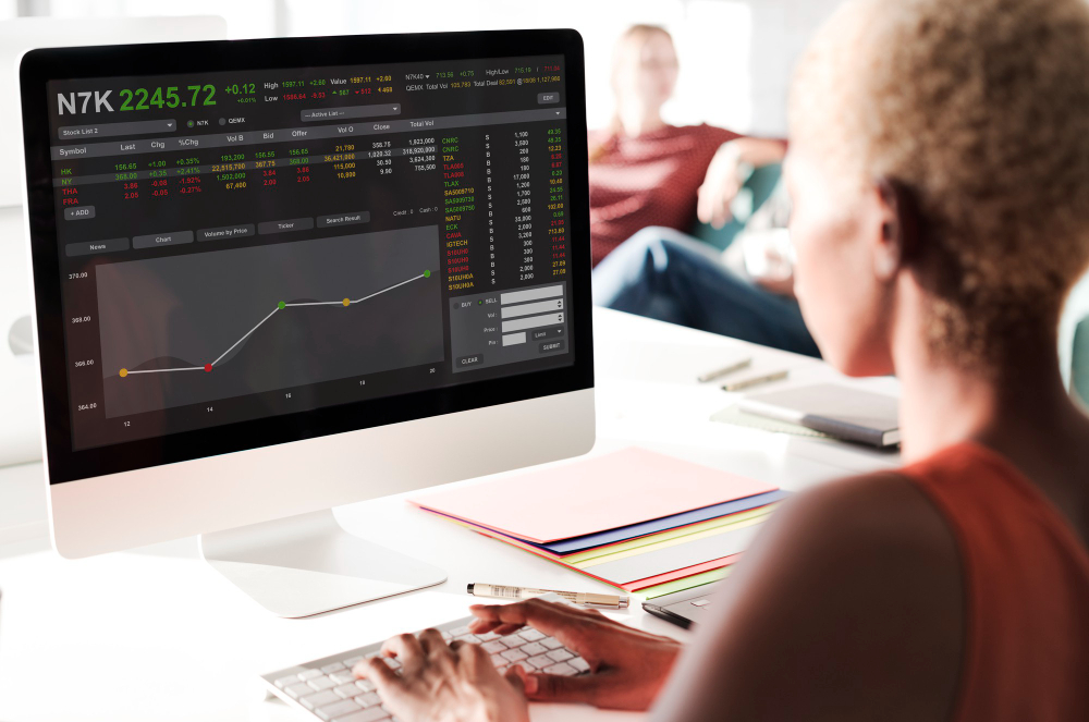 woman trading on a desktop - Day Trading vs Options