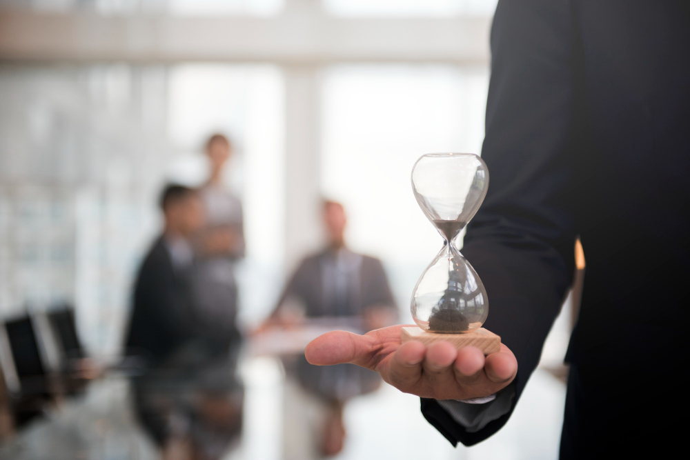 man holding a sand clock - Best Time Frame for Day Trading