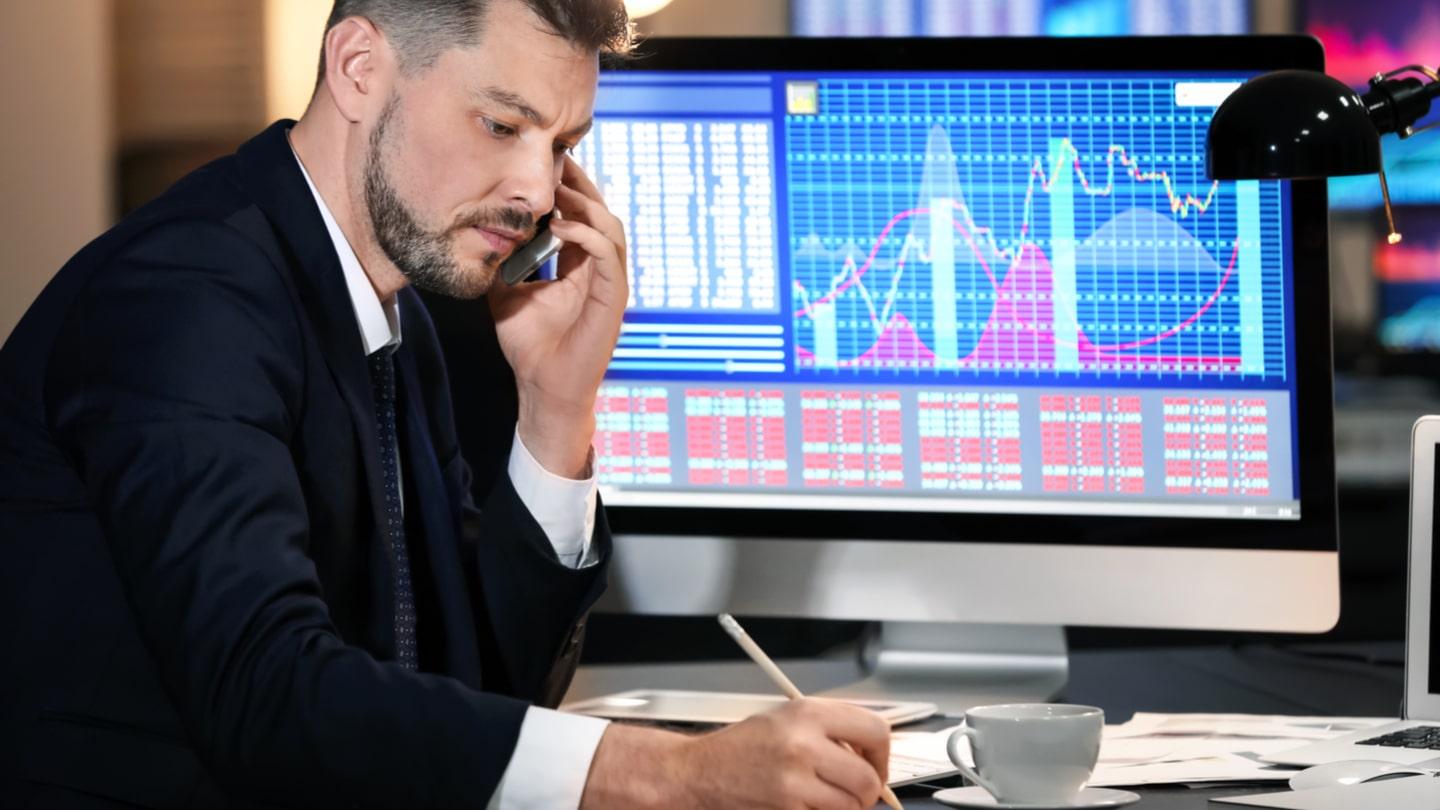 man on a call - Forex Risk Management Tools