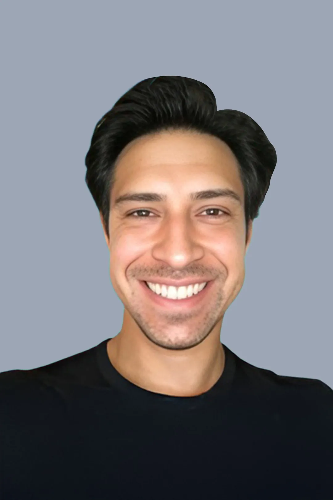 Smiling man with short black hair and light facial stubble wearing a black shirt against a light gray background.