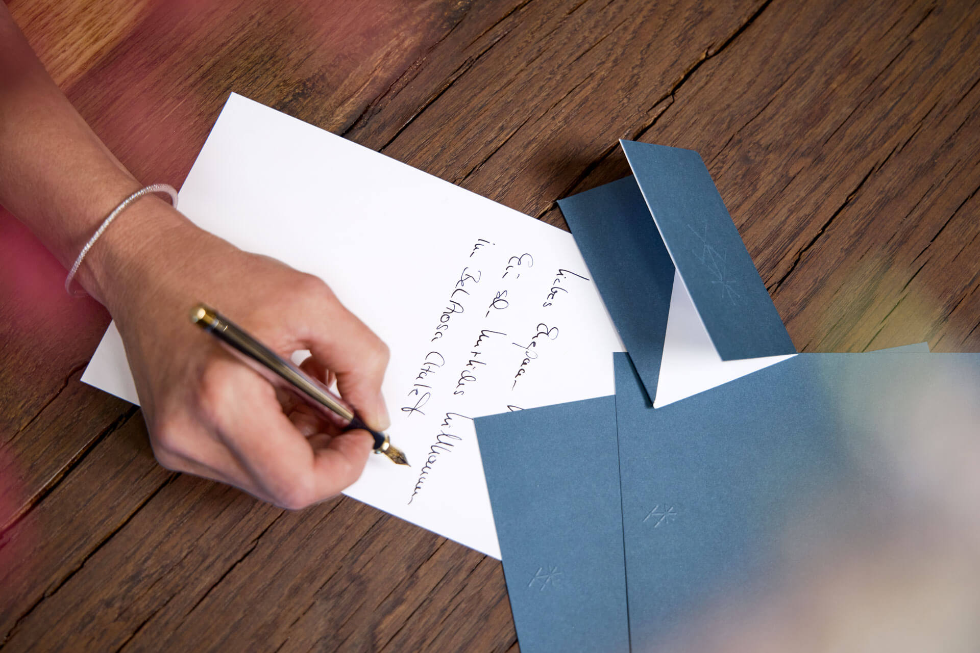 An employee writes a card to a voucher.