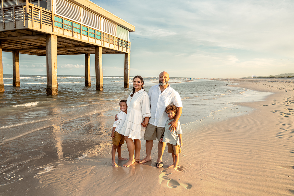 A family beach photo on North Padre Island in the Gulf Coast with a view of the ocean