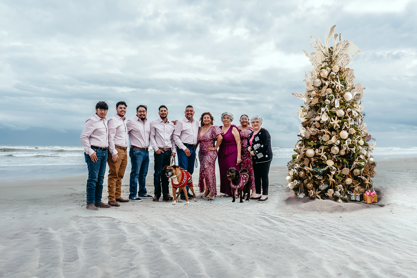 A holiday celebration of grown adult children with a Seashore themed Christmas tree to share with family over the holidays.