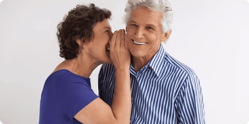 A couple talk close in ear