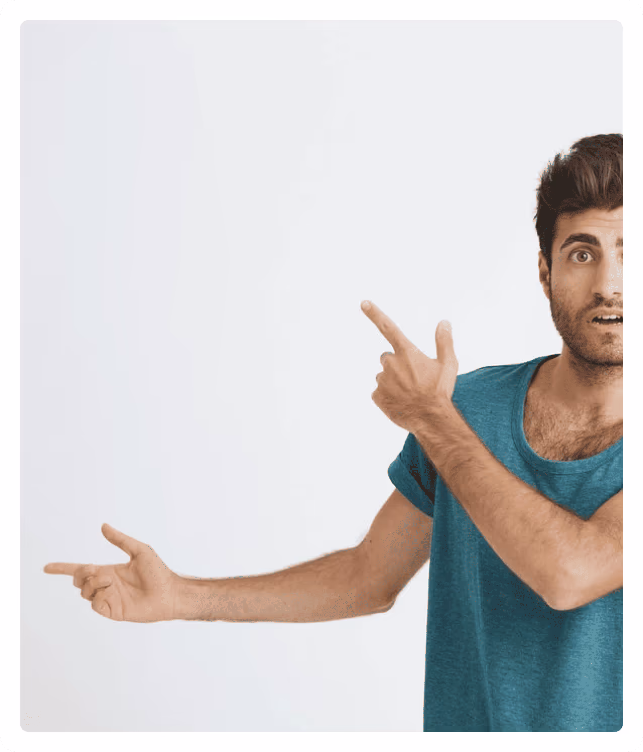 A young man pointing his hands with tense