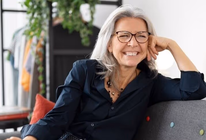 A older person siting with smile