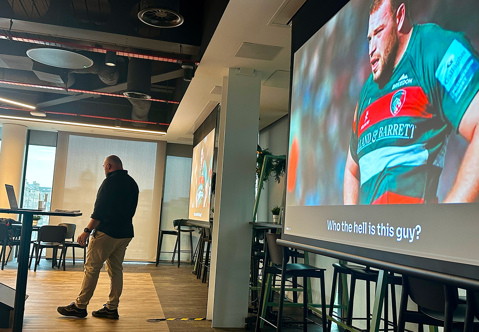 Greg Bateman delivering a live leadership keynote during a Rituals for Performance experience.