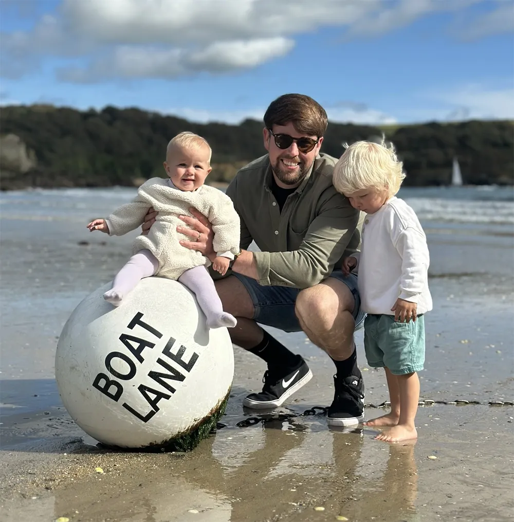 Lee with his two young children.