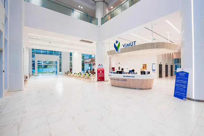 Spacious hospital lobby with ViMUT information desk