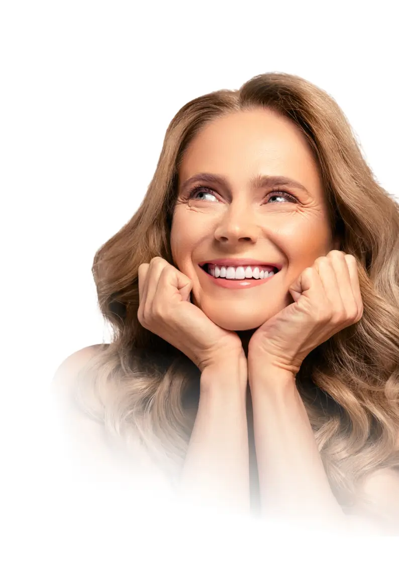 Cheerful woman resting chin on hands

